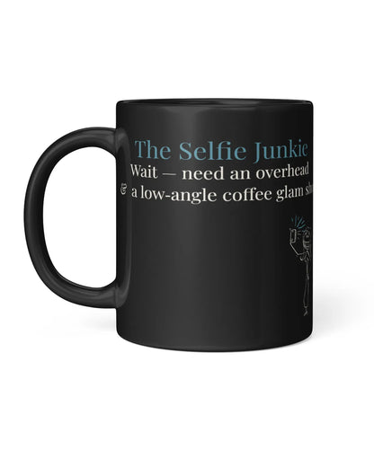 Black mug with humorous text design on a white background