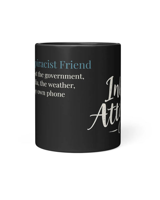 Black mug featuring the text "The Conspiracist Friend" with a humorous quote about distrust in various entities.