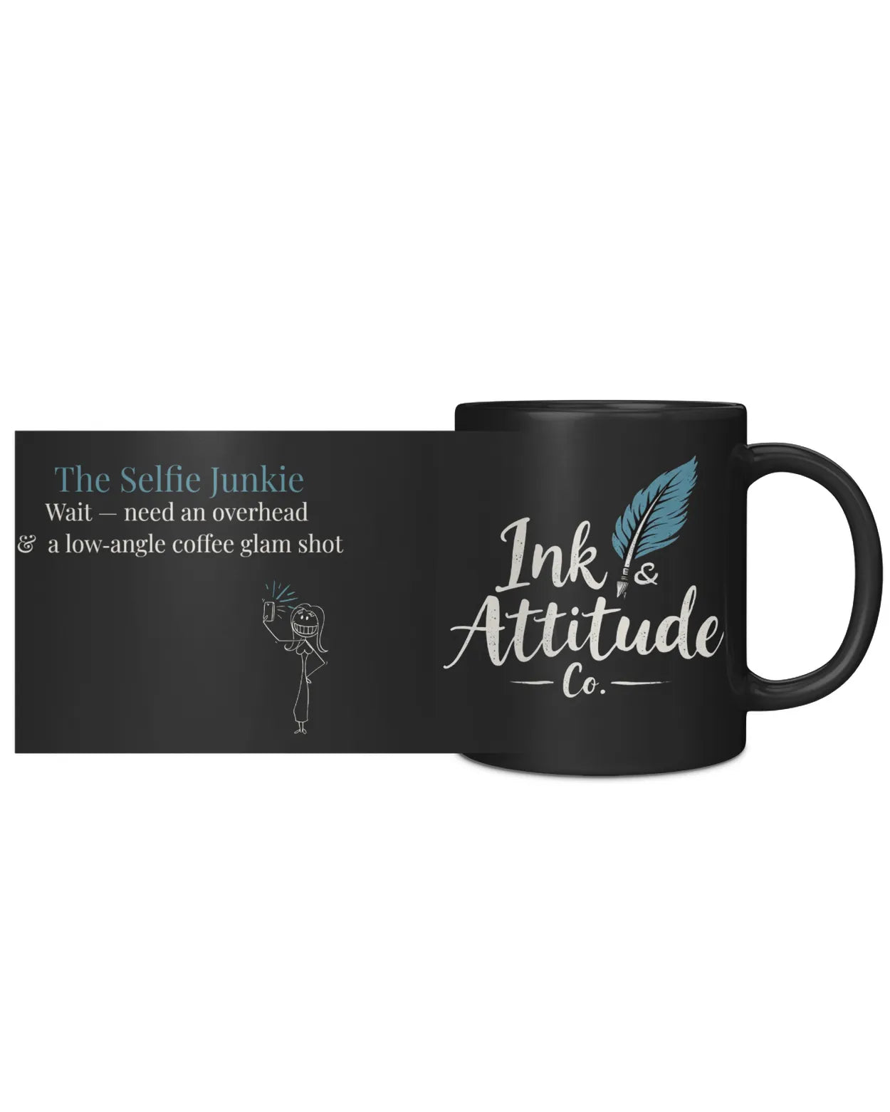 Black coffee mug featuring "The Selfie Junkie" text and a playful illustration, branded with Ink & Attitude Co. logo.