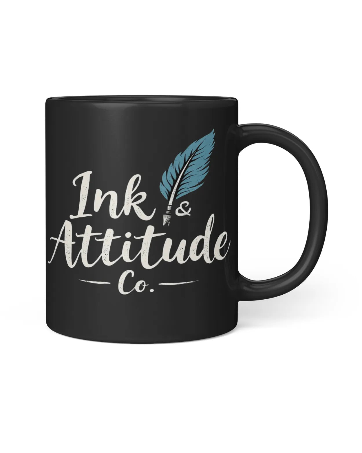 Black coffee mug featuring the text "Ink & Attitude Co." with a feather design, perfect for selfie enthusiasts.